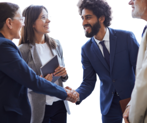 sales team shaking hands